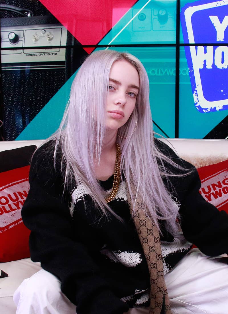 Close-up of Billie with long hair sitting