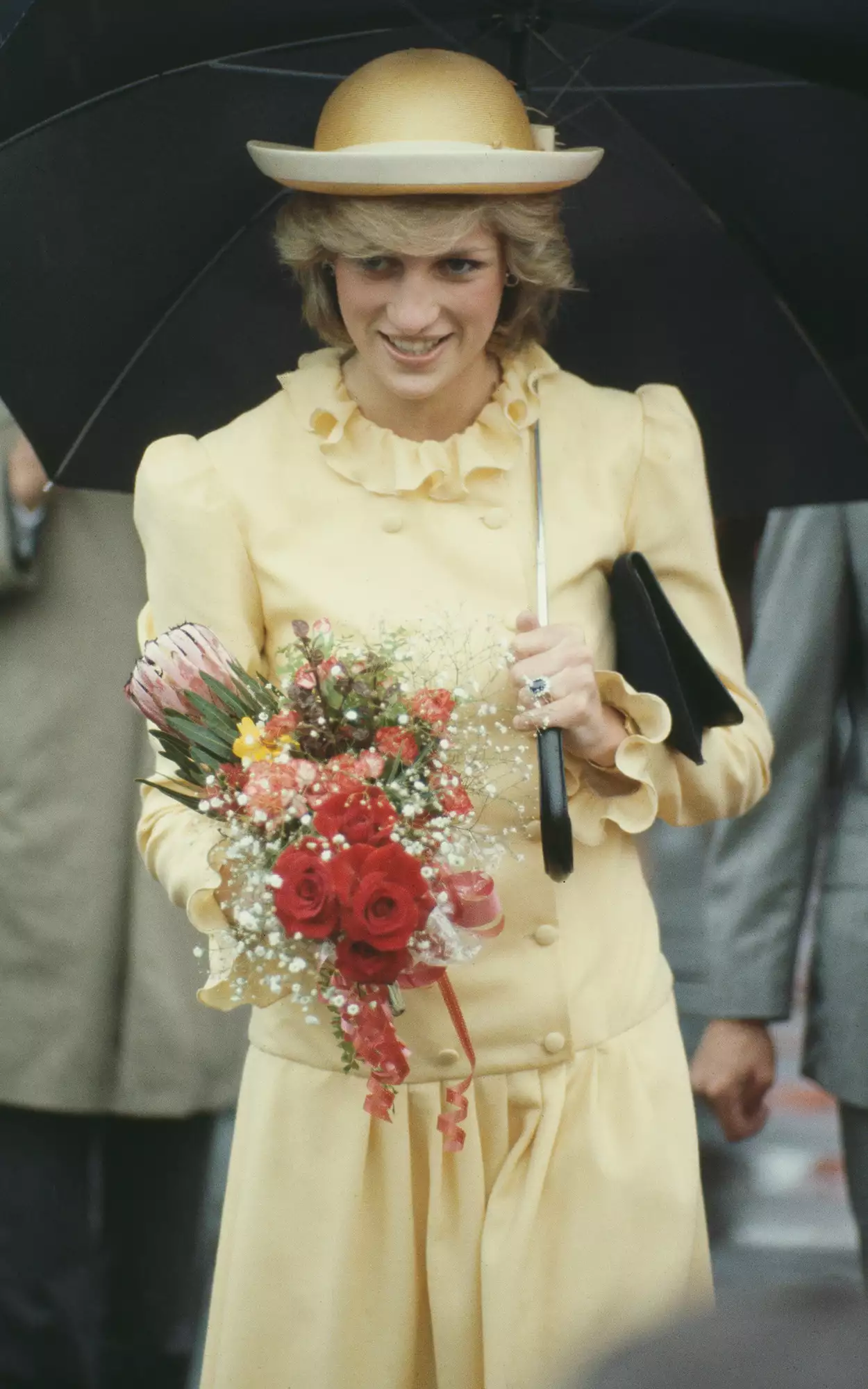 Diana, Princess of Wales (1961 - 1997) visits the Pupuke School on the North Shore in New Zealand, April 1983. She is wearing a Catherine Walker suit and a John Boyd hat