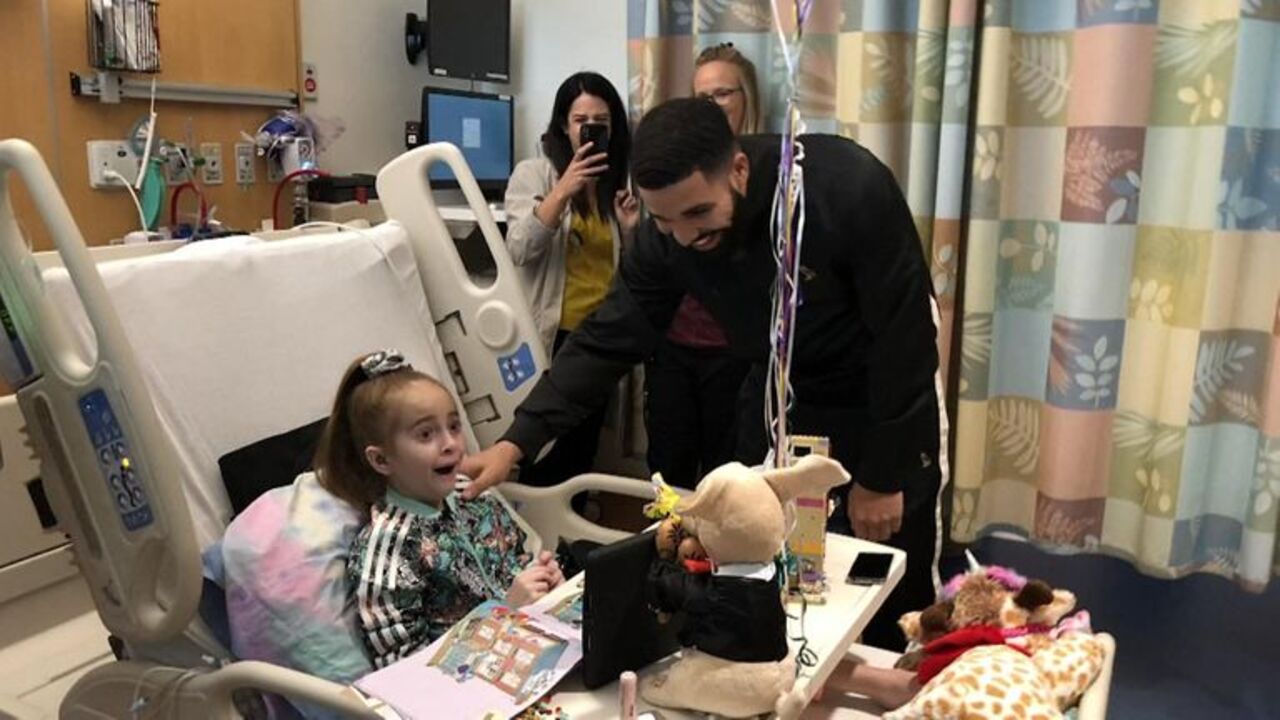 Drake pays a surprise visit to a patient awaiting a heart transplant at Lurie Children's Hospital of Chicago.