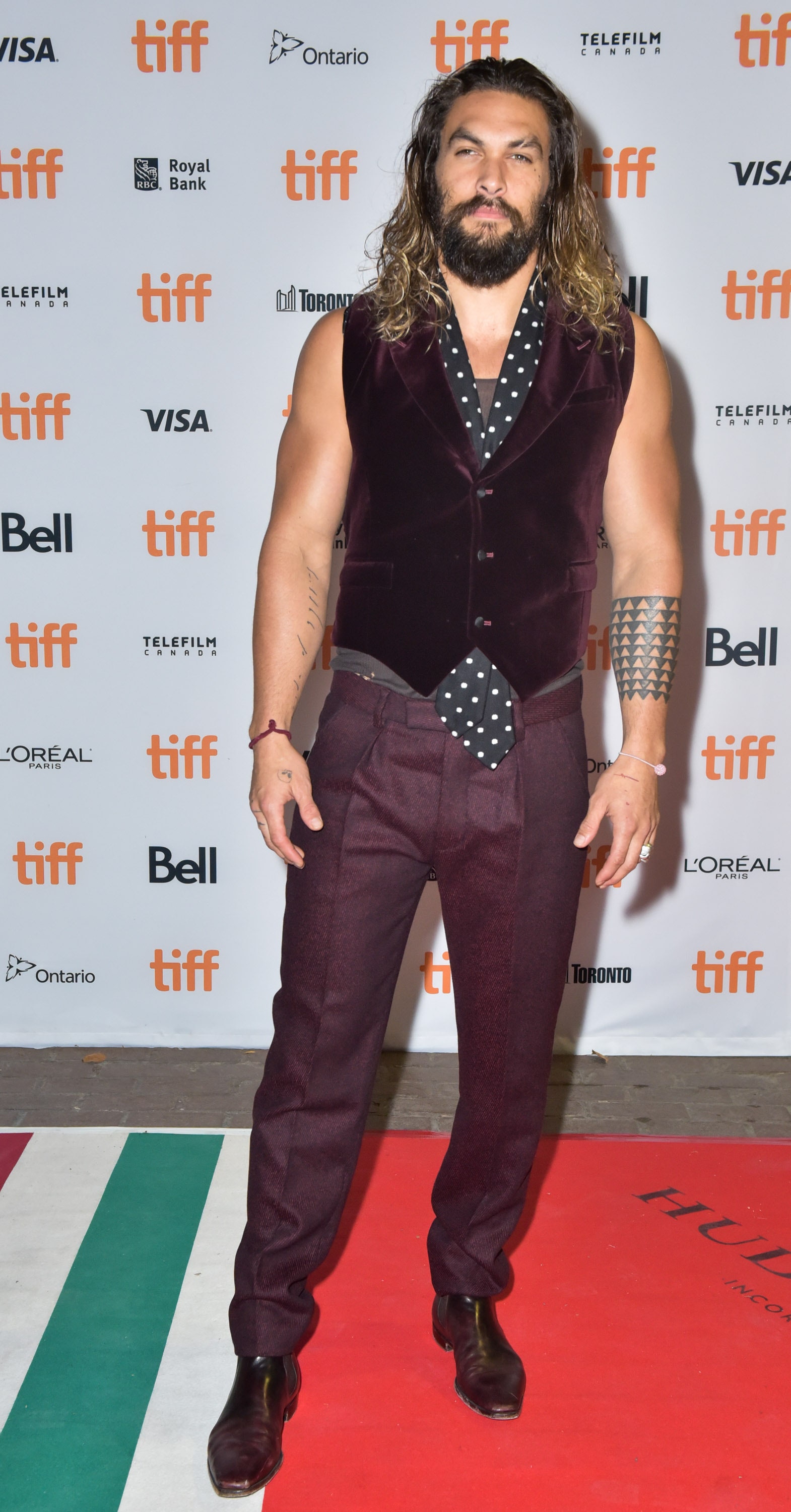 Image may contain Jason Momoa Fashion Human Person Premiere Clothing Footwear Apparel and Shoe