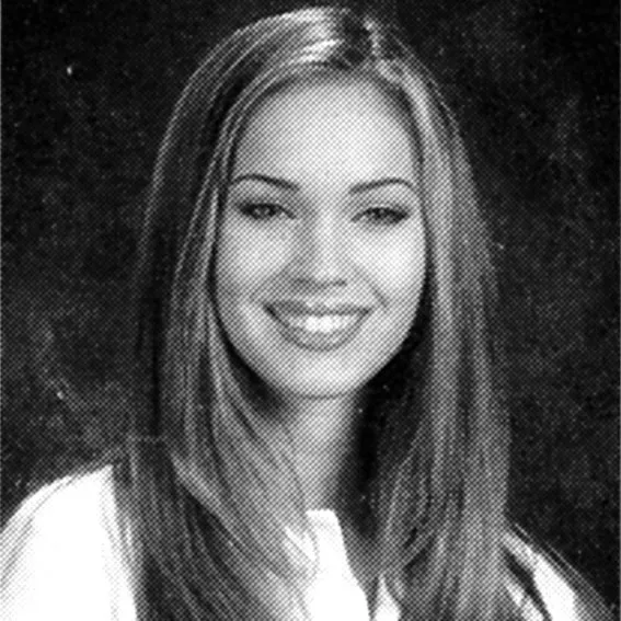 Megan Fox high school photo with thin brows, glossy lips, and long, straight hair