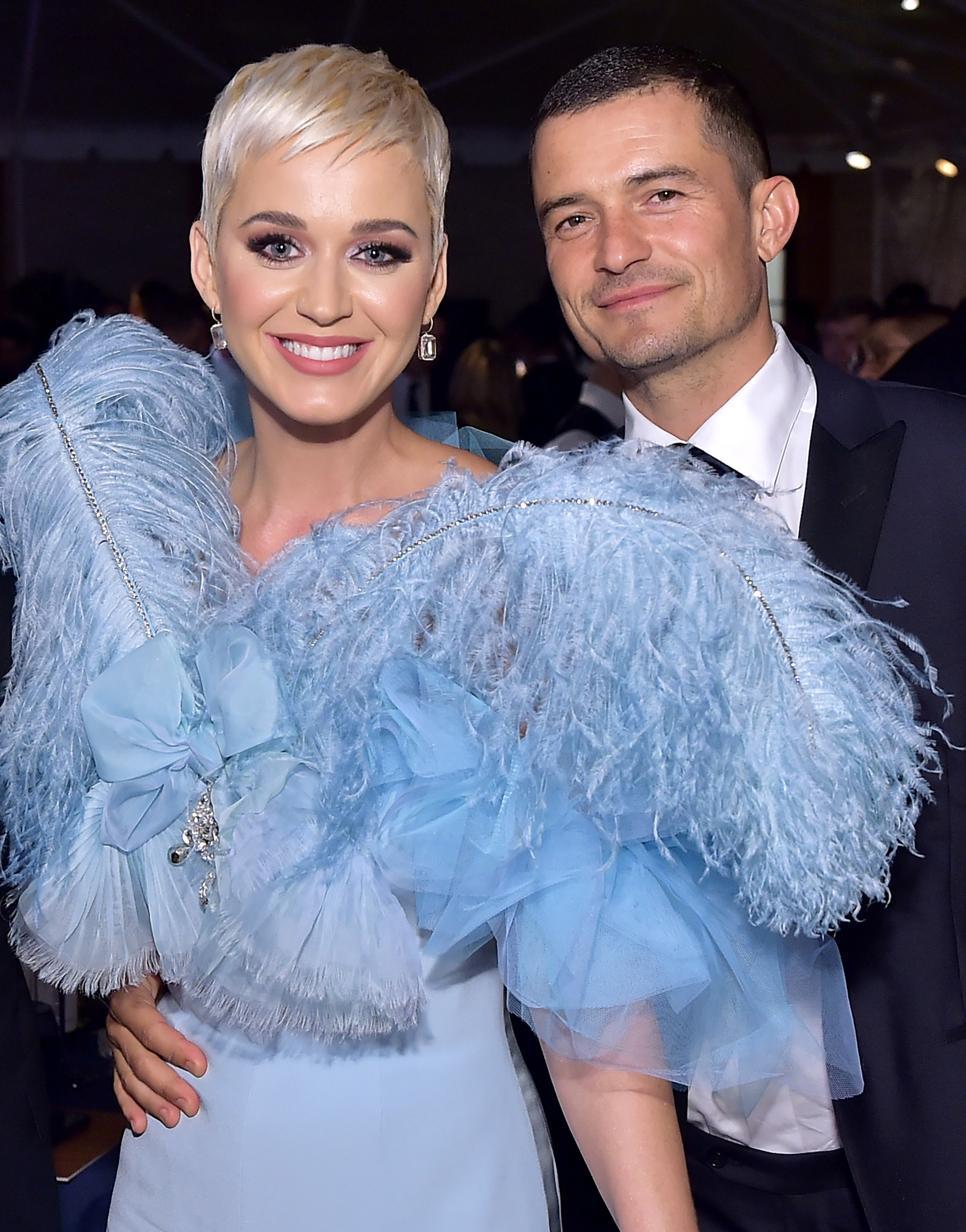 Katy Perry and Orlando Bloom posing for a photo together