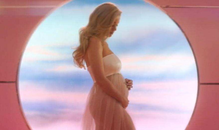 A screenshot of Katy Perry pregnant in her music video