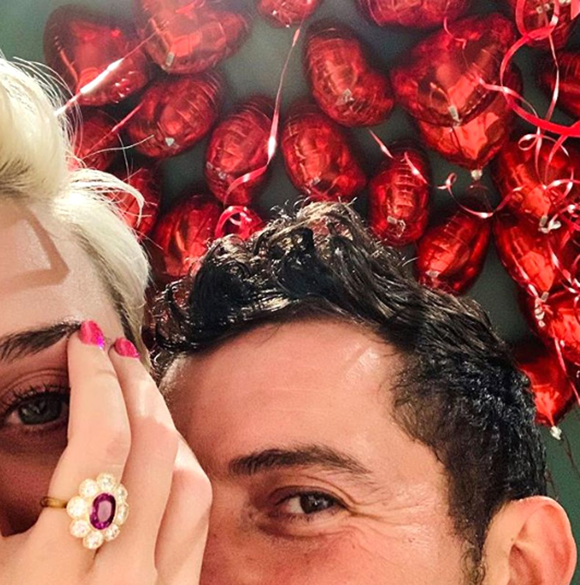 A selfie or Orlando Bloom and Katy Perry with her engagement ring