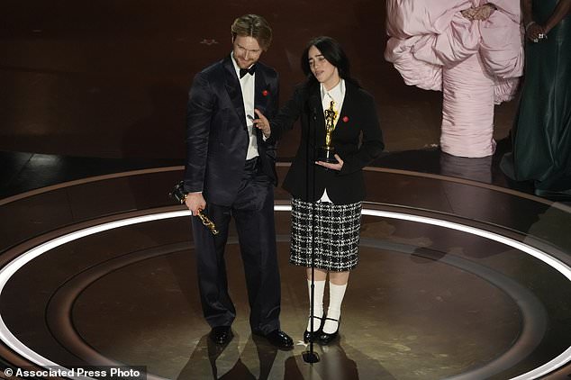 Finneas O'Connell, left, and Billie Eilish accept the award for best original song for "What Was I Made For?" from "Barbie" during the Oscars on Sunday, March 10, 2024, at the Dolby Theatre in Los Angeles. (AP Photo/Chris Pizzello)