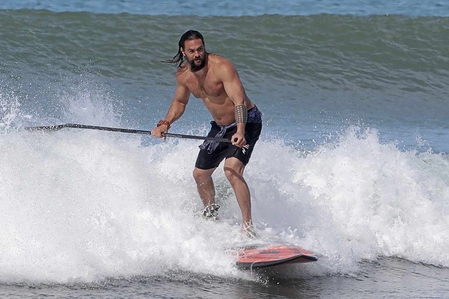 Jason Momoa Shows Off Chiseled Physique While Paddle Boarding in Hawaii