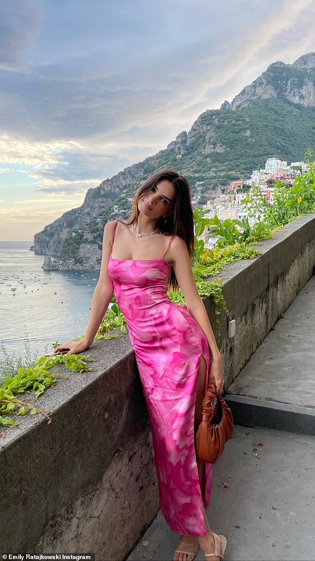 Emily Ratajkowski shows off her stunning curves in a backless pink slip dress on her Italian getaway | Daily Mail Online