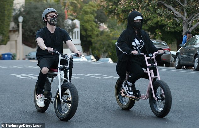 Hitting the pavement: Billie Eilish and her brother and producer Finneas were spotted riding their bikes through the streets of Los Angeles on Monday