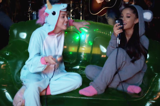 Miley Cyrus & Ariana Grande Perform An '80s Classic In Onesies | Billboard – Billboard