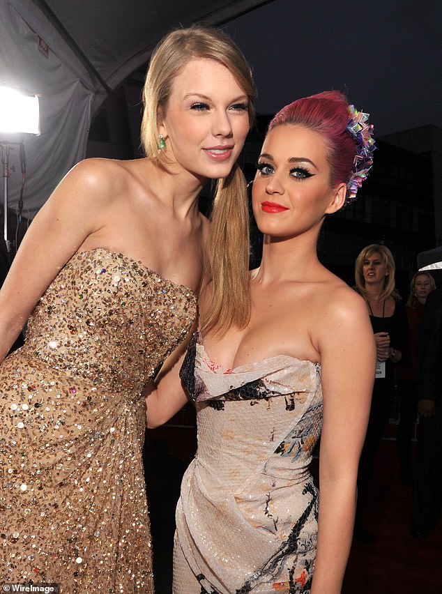 Taylor and Katy pictured together at the 2011 American Music Awards, a couple of years before their feud