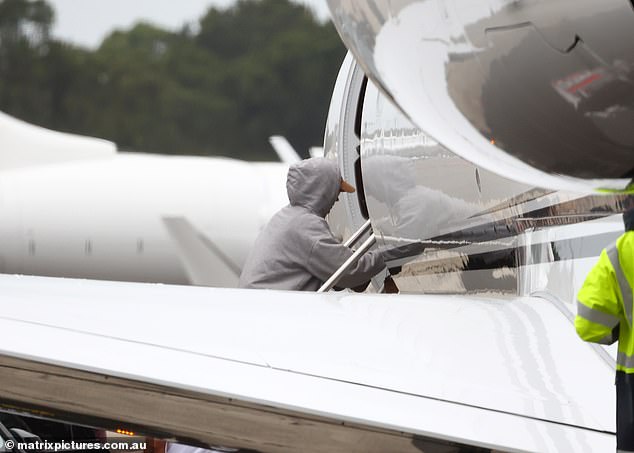 Katy Perry made a low-key exit from Sydney on Saturday morning after a whirlwind evening at Taylor Swift 's hotly-anticipated Eras tour show on Friday night