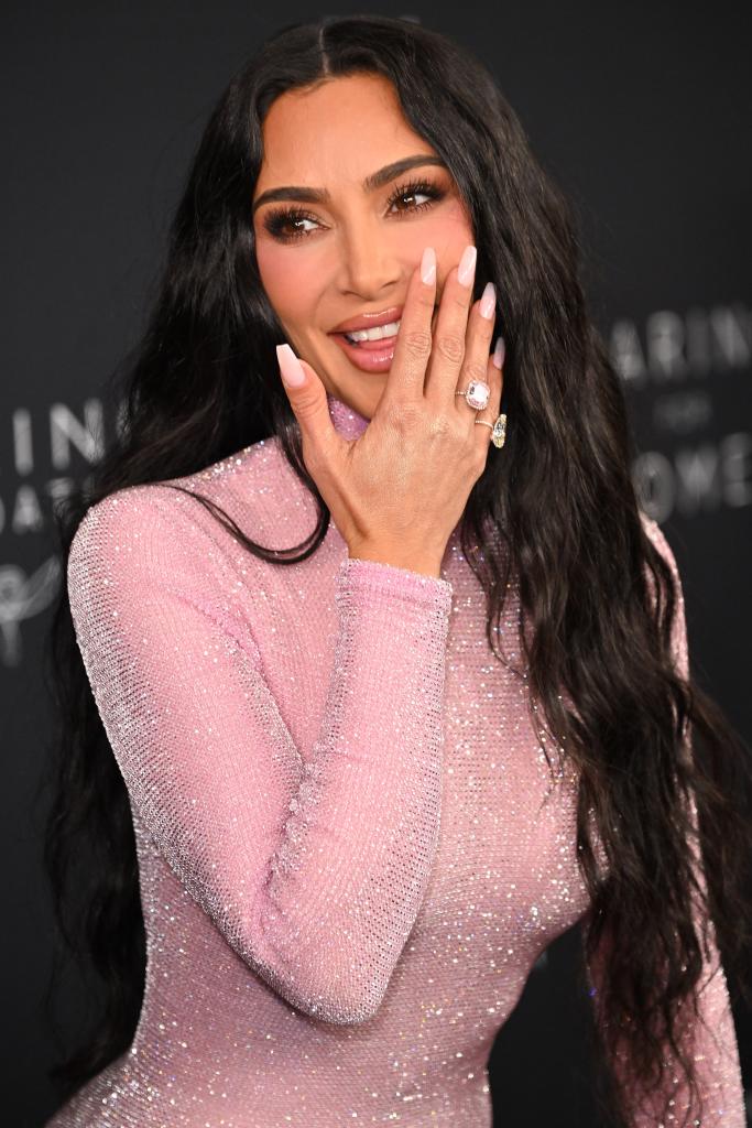 Kim Kardashian keeps 'future alien Barbie' vibe going in sparkling pink gown