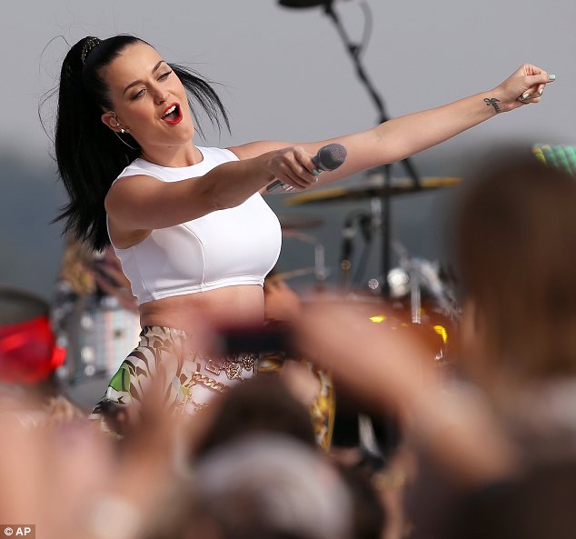 Singalong: The audience joined the 29-year-old in belting out her hits outside the Sydney Opera House