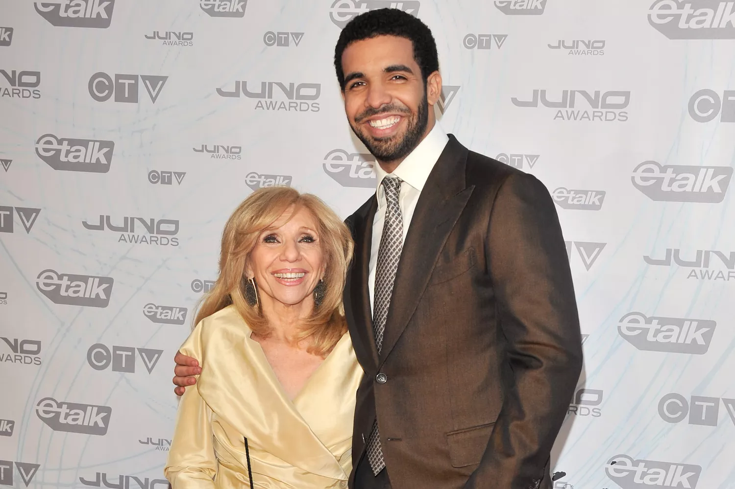 Host/singer Drake (R) with his mother Sandi Graham pose on the red carpet at the 2011 Juno Awards at the Air Canada Centre on March 27, 2011 in Toronto, Canada. (Photo by George Pimentel/WireImage)