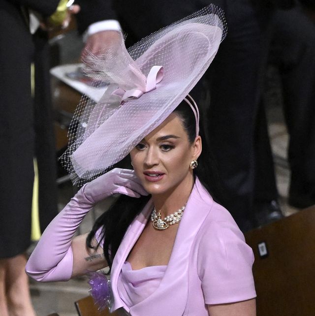 london, england may 06 katy perry departs the coronation of king charles iii and queen camilla on may 06, 2023 in london, england the coronation of charles iii and his wife, camilla, as king and queen of the united kingdom of great britain and northern ireland, and the other commonwealth realms takes place at westminster abbey today charles acceded to the throne on 8 september 2022, upon the death of his mother, elizabeth ii photo by gareth cattermolegetty images