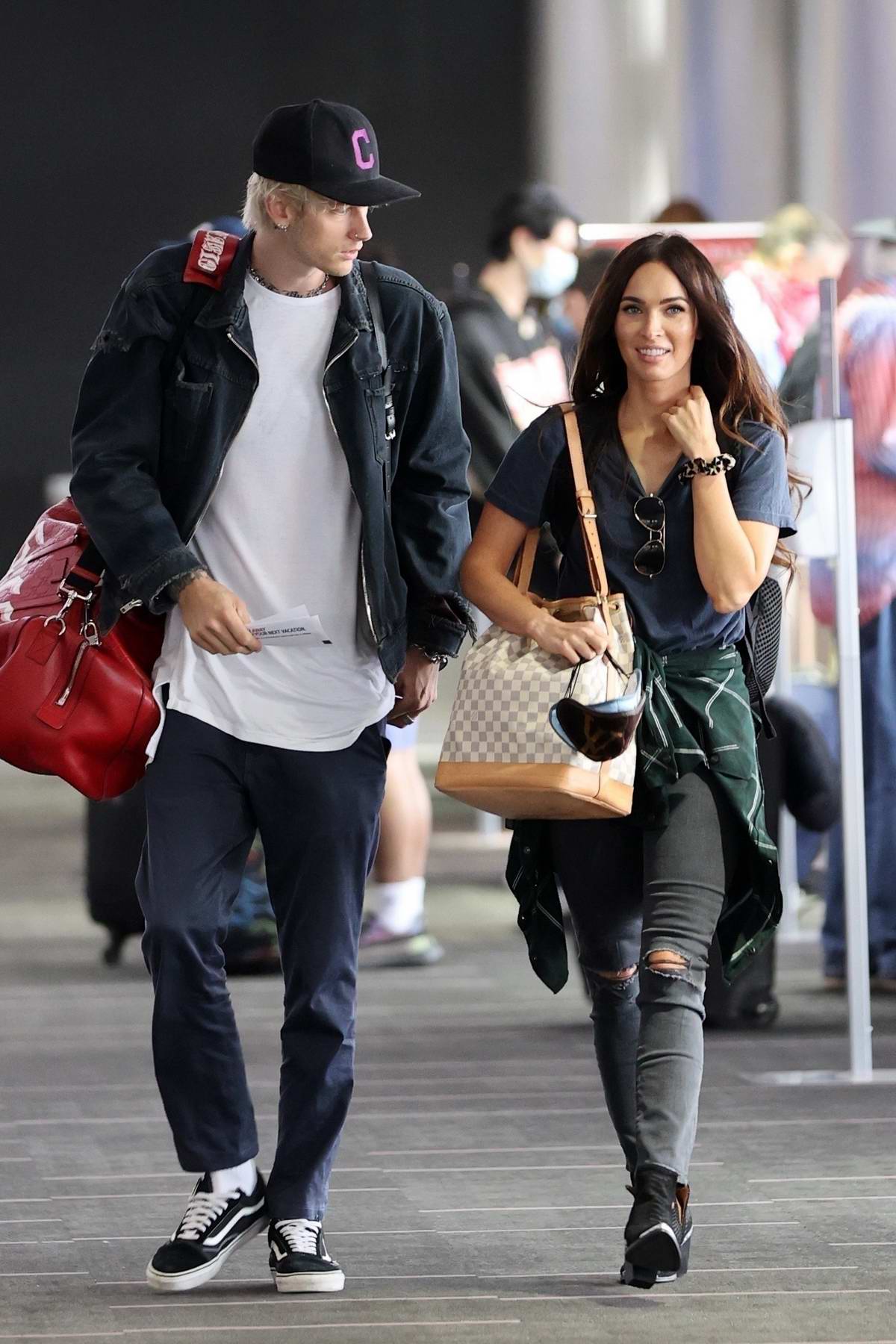 megan fox and machine gun kelly are seen arriving at lax airport in los angeles-290620_12