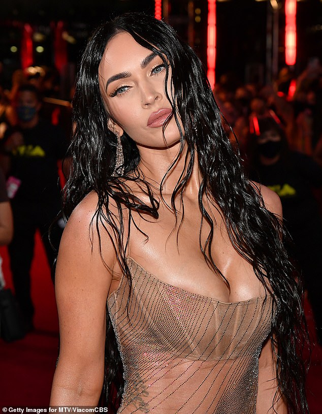 In a sheer Mugler gown and long "wet" locks, Megan Fox appeared to have just gone skinny dipping