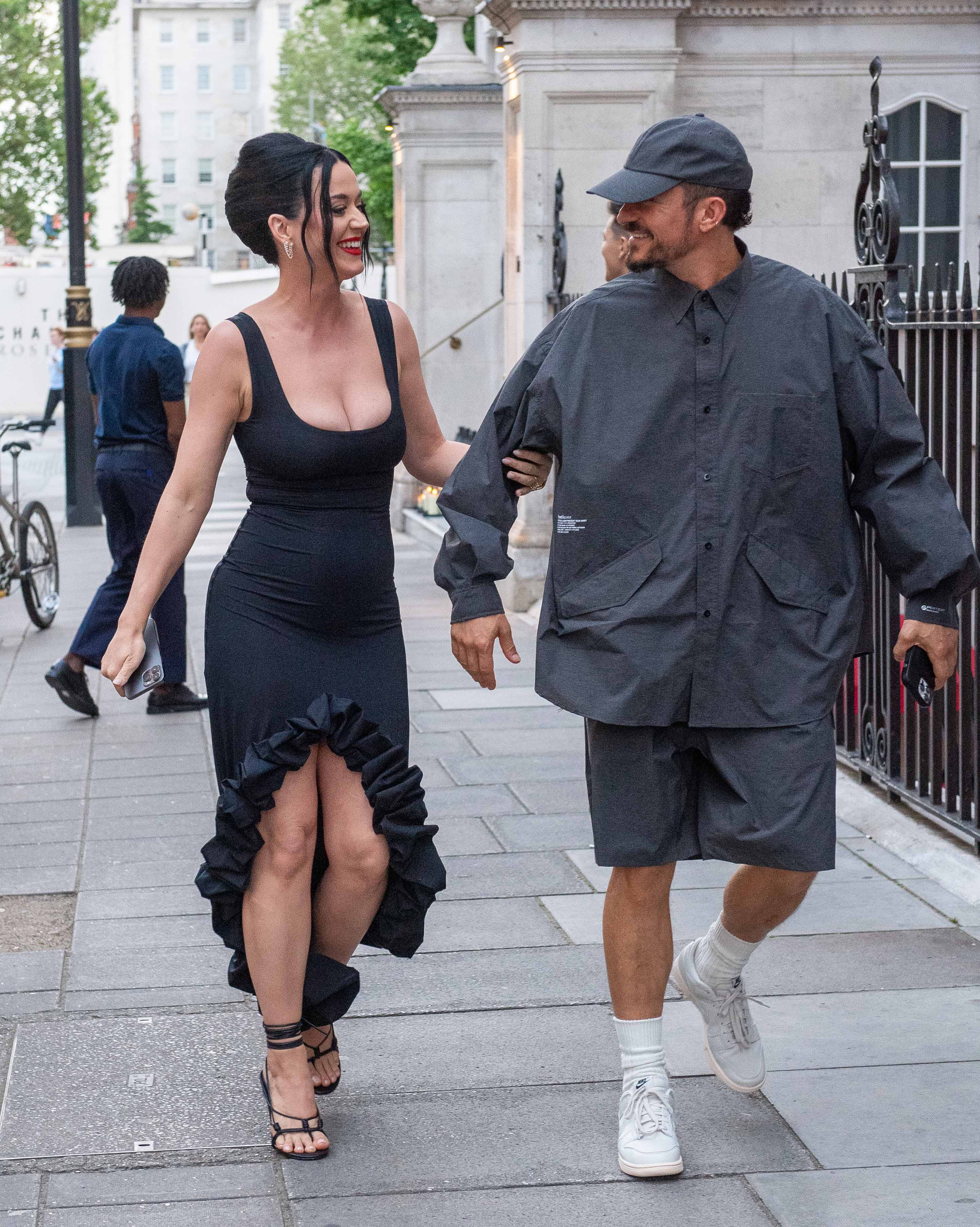 Katy Perry nearly busts out of skintight dress on London trip with Orlando Bloom during break from American Idol | The US Sun