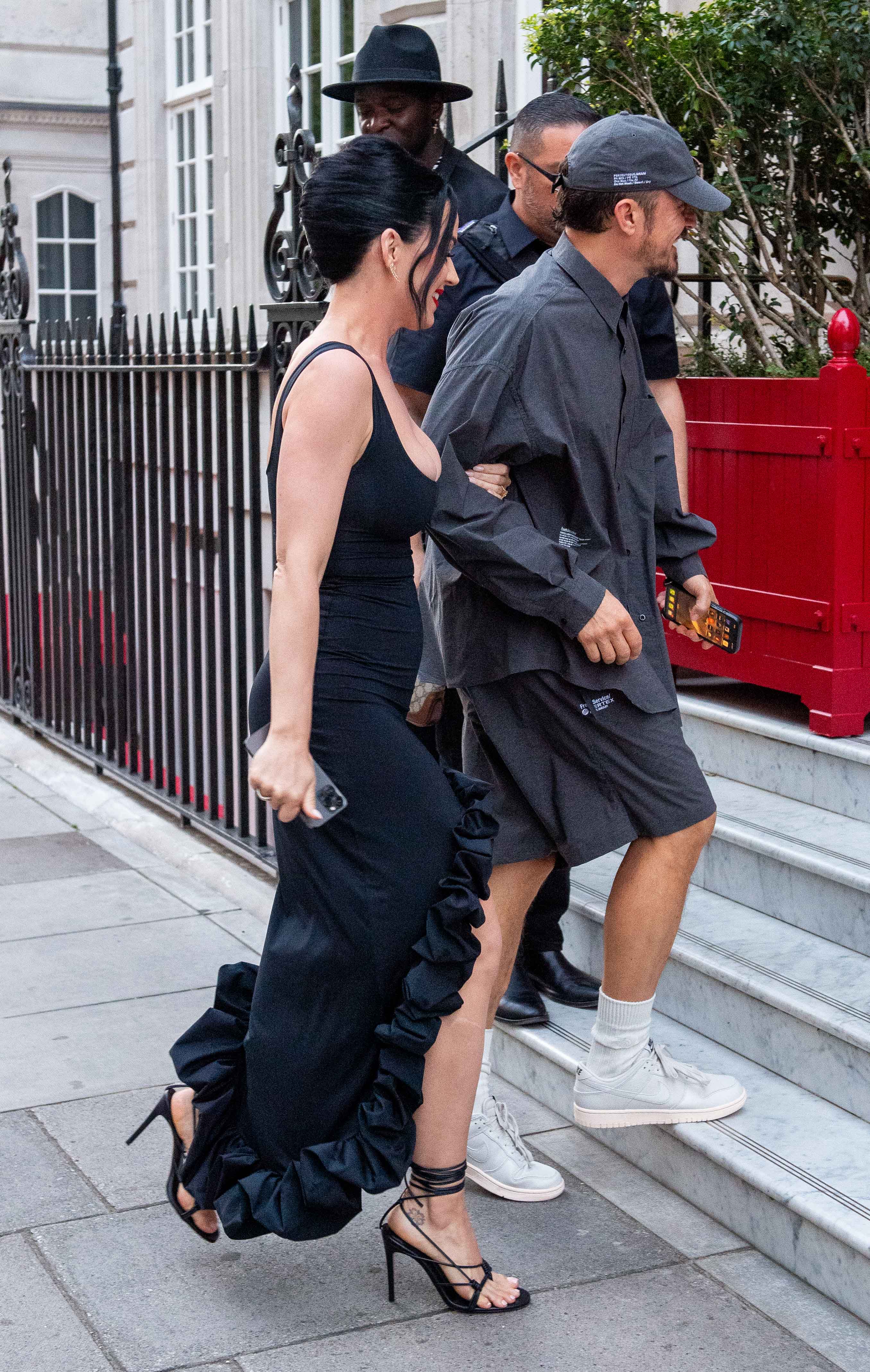 Katy Perry nearly busts out of skintight dress on London trip with Orlando Bloom during break from American Idol | The US Sun