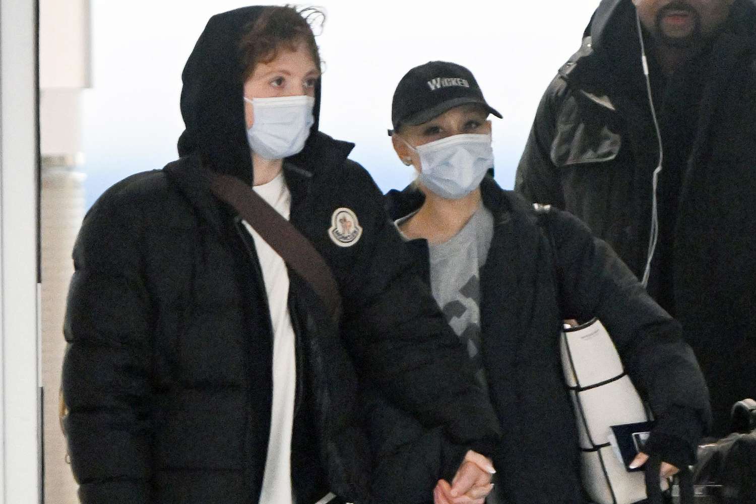 Ariana Grande and Ethan Slater Hold Hands at Airport