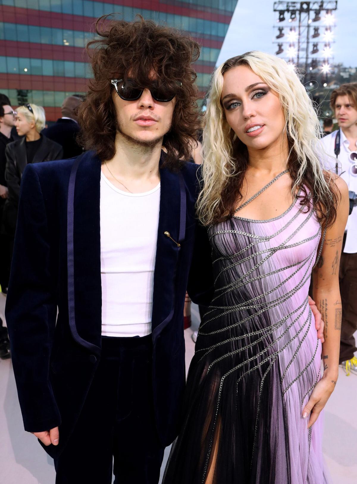 Miley Cyrus Makes Rare Red Carpet Appearance with Boyfriend Maxx Morando at Versace Fashion Show