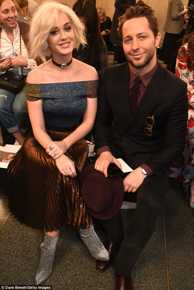 FROW friends: The glam pair looked stylish on the front row - as they rubbed shoulders with the stars