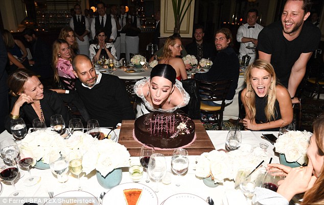 Birthday girl: Katy Perry was treated to a lavish birthday cake at the Council Of Fashion Designers Of America/Vogue Fashion Fund's Show and Tea on Wednesday