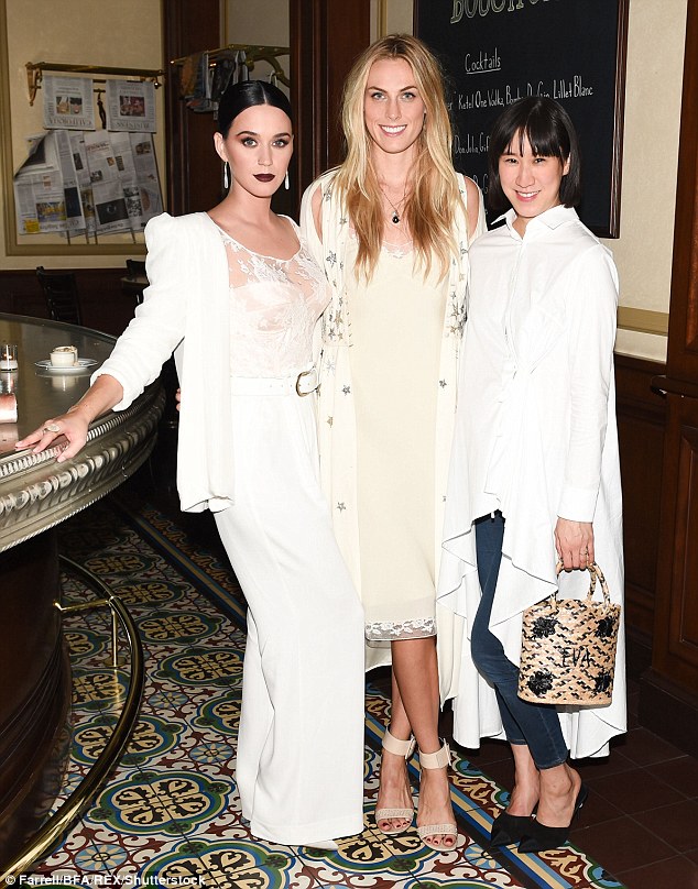 Terrific trio: Katy was joined by Shelby Drummond and Eva Chen at the party 