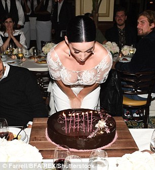 Make a wish! Clearly overjoyed by the sweet treat, the pop starlet was seen gleefully blowing out her candles as the guests at Thomas Keller's Bouchon Beverly Hills cheered on