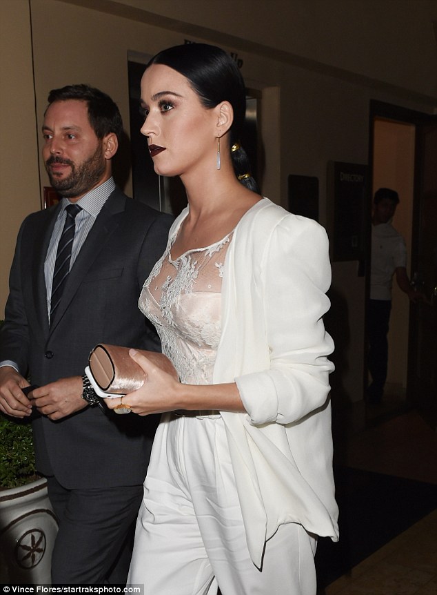 Assets: This in turn revealed plenty of cleavage in an off-white corset