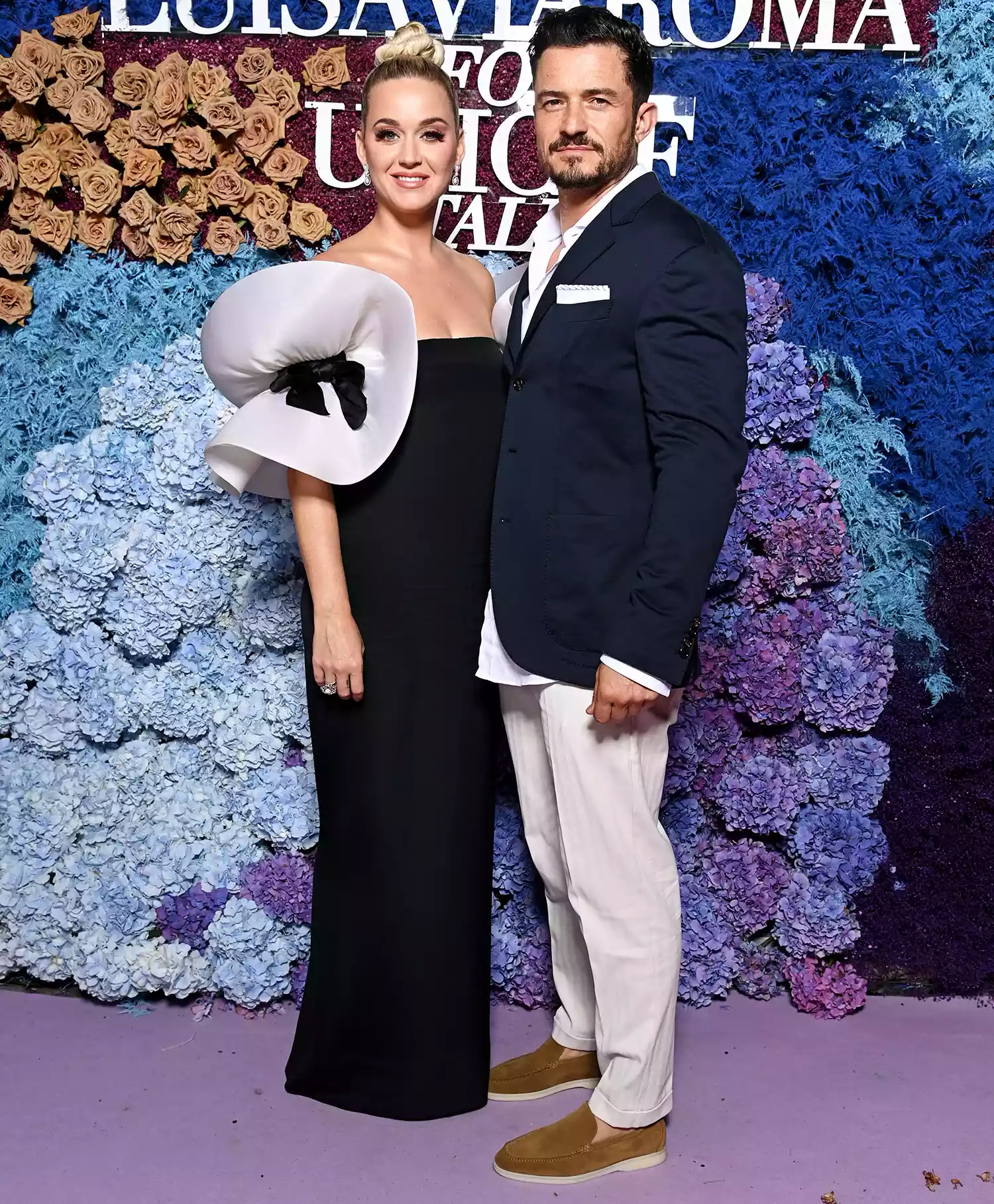 Katy Perry and Orlando Bloom attend the LuisaViaRoma for Unicef event at La Certosa di San Giacomo on July 31, 2021 in Capri, Italy.