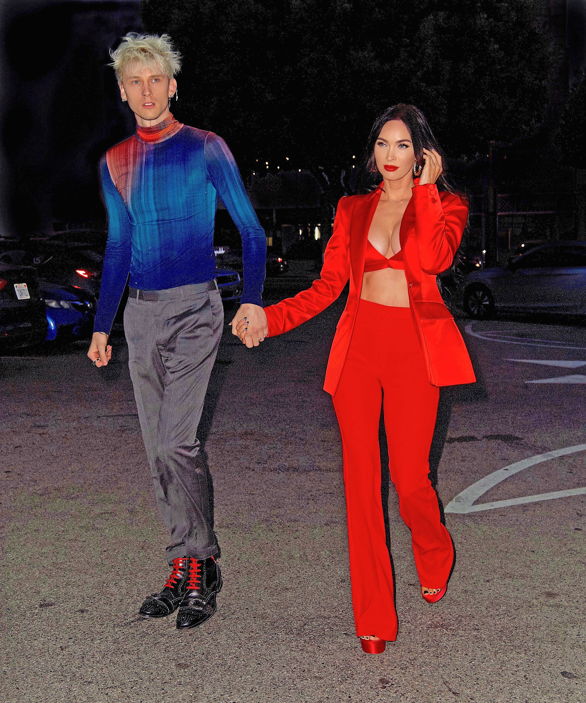 Megan Fox sizzles in red suit and bra with Machine Gun Kelly