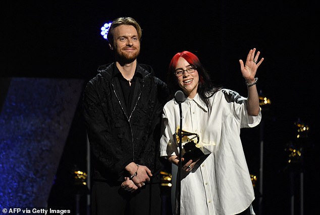 The Bad Guy singer - who recently opened up about being 'attracted' to women - wore an oversized white button-up shirt and a pair of wide-legged black pants during the ceremony