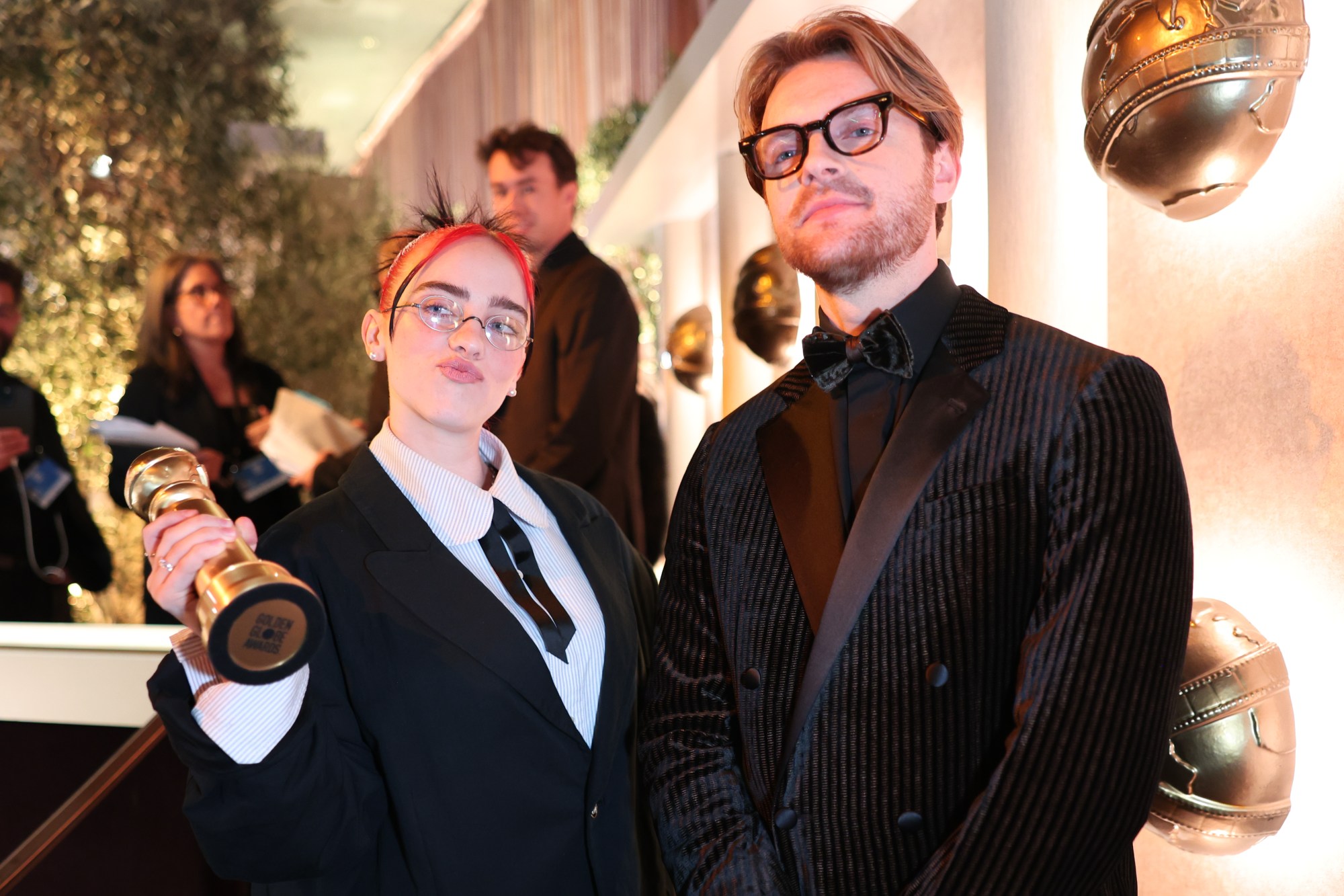 Billie Eilish and FINNEAS beam while holding their Golden Globe for Best  Original Song - Motion Picture - Golden Globes