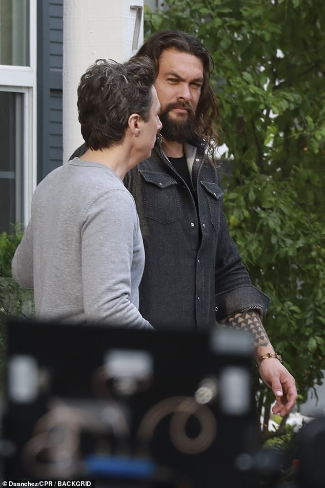 Momoa looked typically handsome with a full beard as he interacted with his peers ahead of the February 11 game day