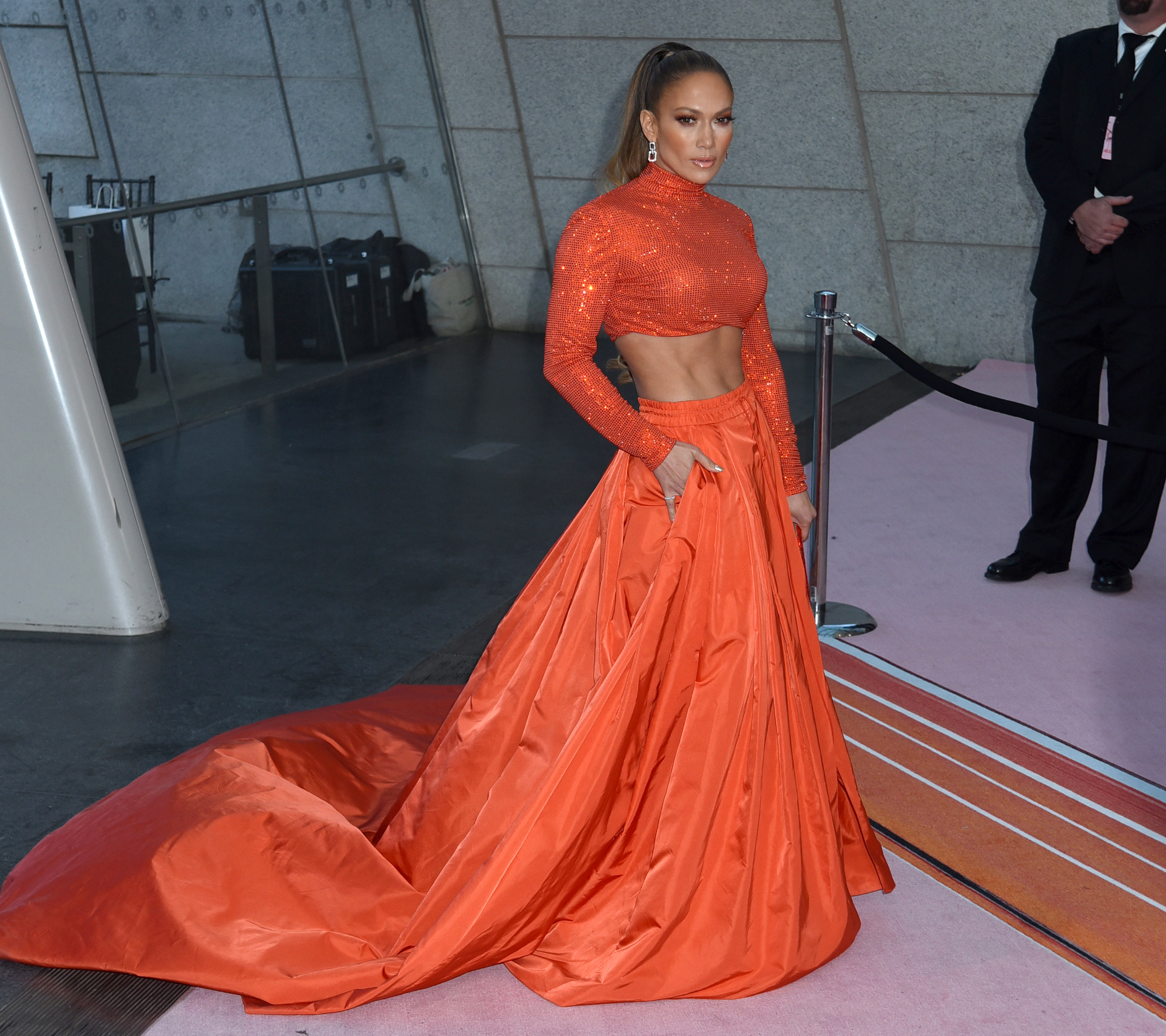 Jennifer Lopez stuns in orange dress with 43k crystals and snogs fiancé  Alex Rodriguez – The Sun | The Sun