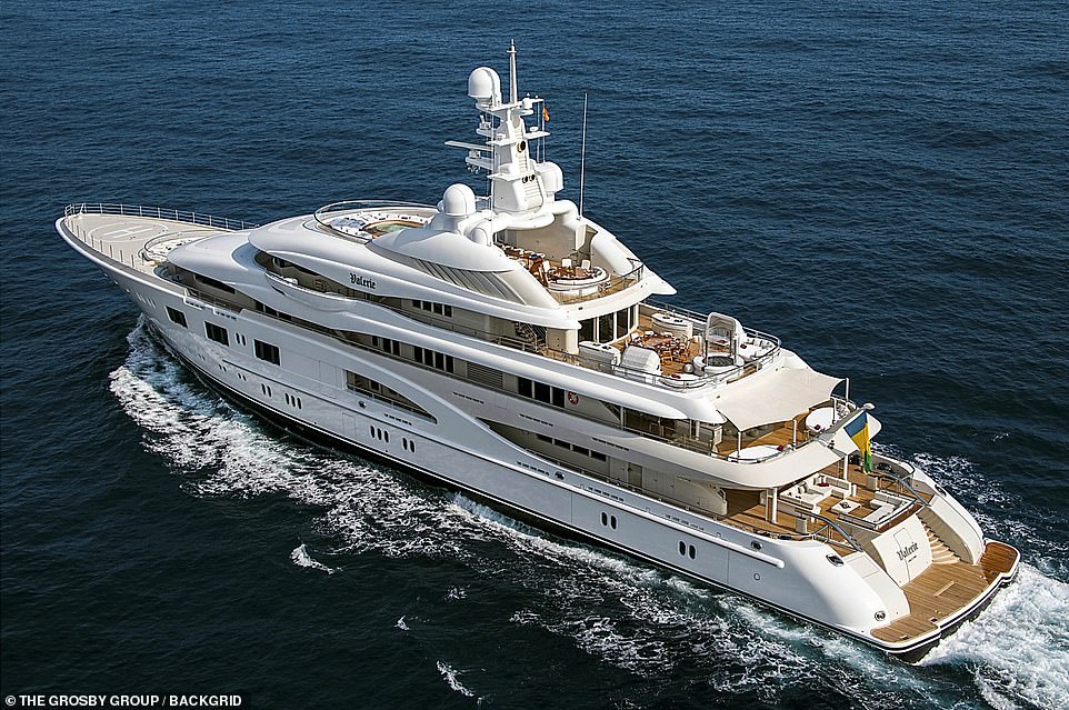 Must be nice: After flying in to the French Riviera on a luxury private jet, the couple were quickly whisked away to their yacht named Valerie, in the Mediterranean, where they were spotted exchanging kisses and tender embraces on the sun deck