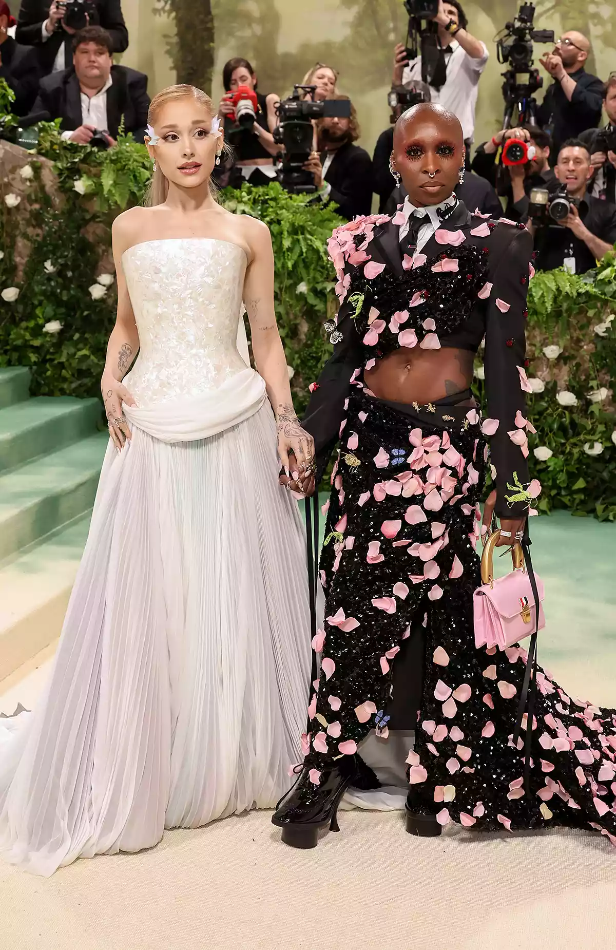 Ariana Grande and Cynthia Erivo attend The 2024 Met Gala Celebrating "Sleeping Beauties: Reawakening Fashion" at The Metropolitan Museum of Art on May 06, 2024 in New York City.