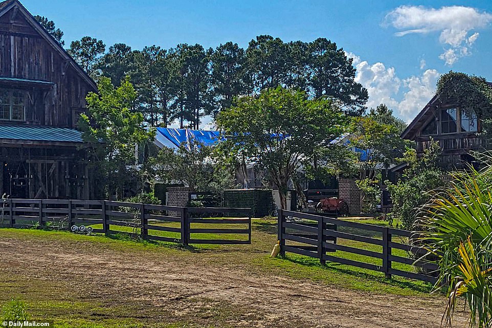 PICTURED: outside the farmhouse where the couple's glamorous wedding was held