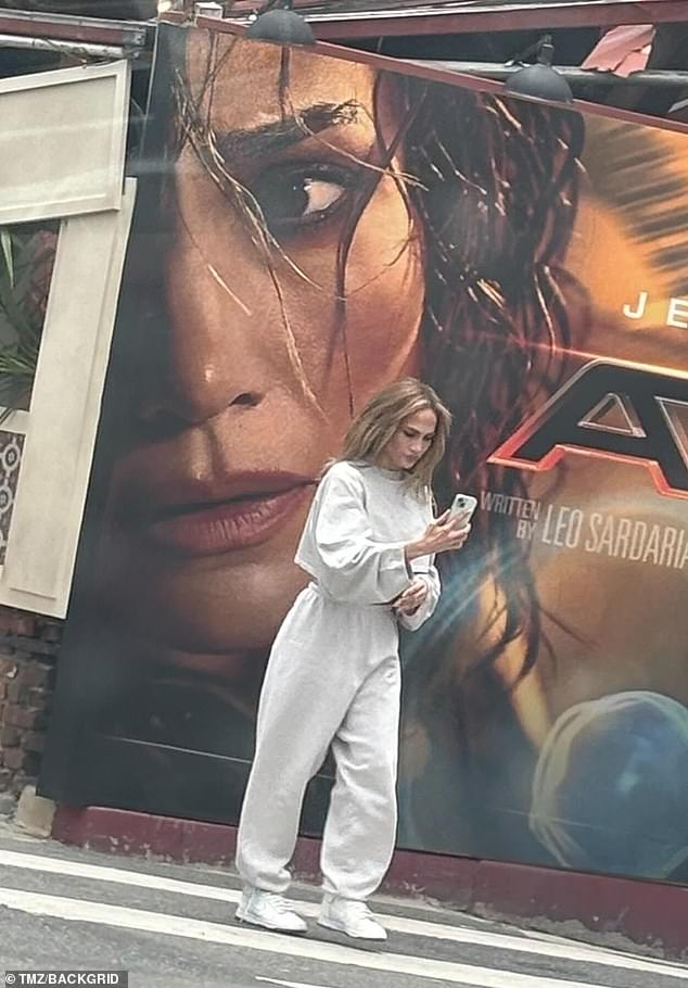 The actress was seen dressed in an oversize, long-sleeved crop top teamed with a matching pair of white sweatpants and sneakers