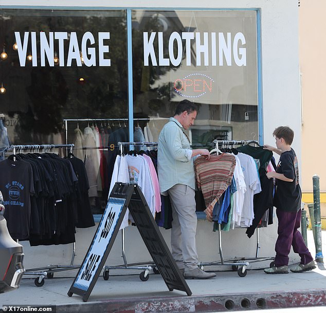 The two-time Oscar-winner was pictured with his son Samuel, 12, on Monday shopping for vintage clothes