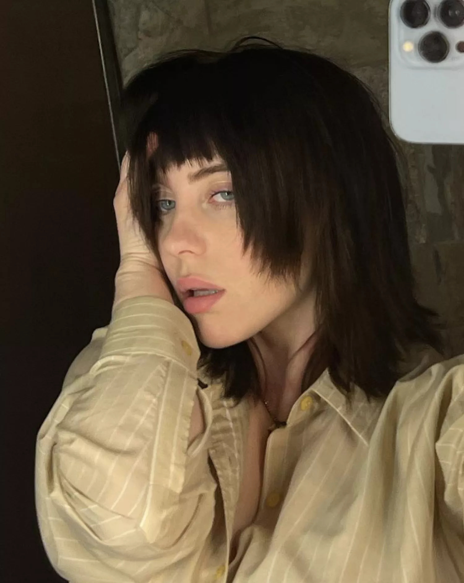 Billie Eilish in Asymmetric curtain bangs