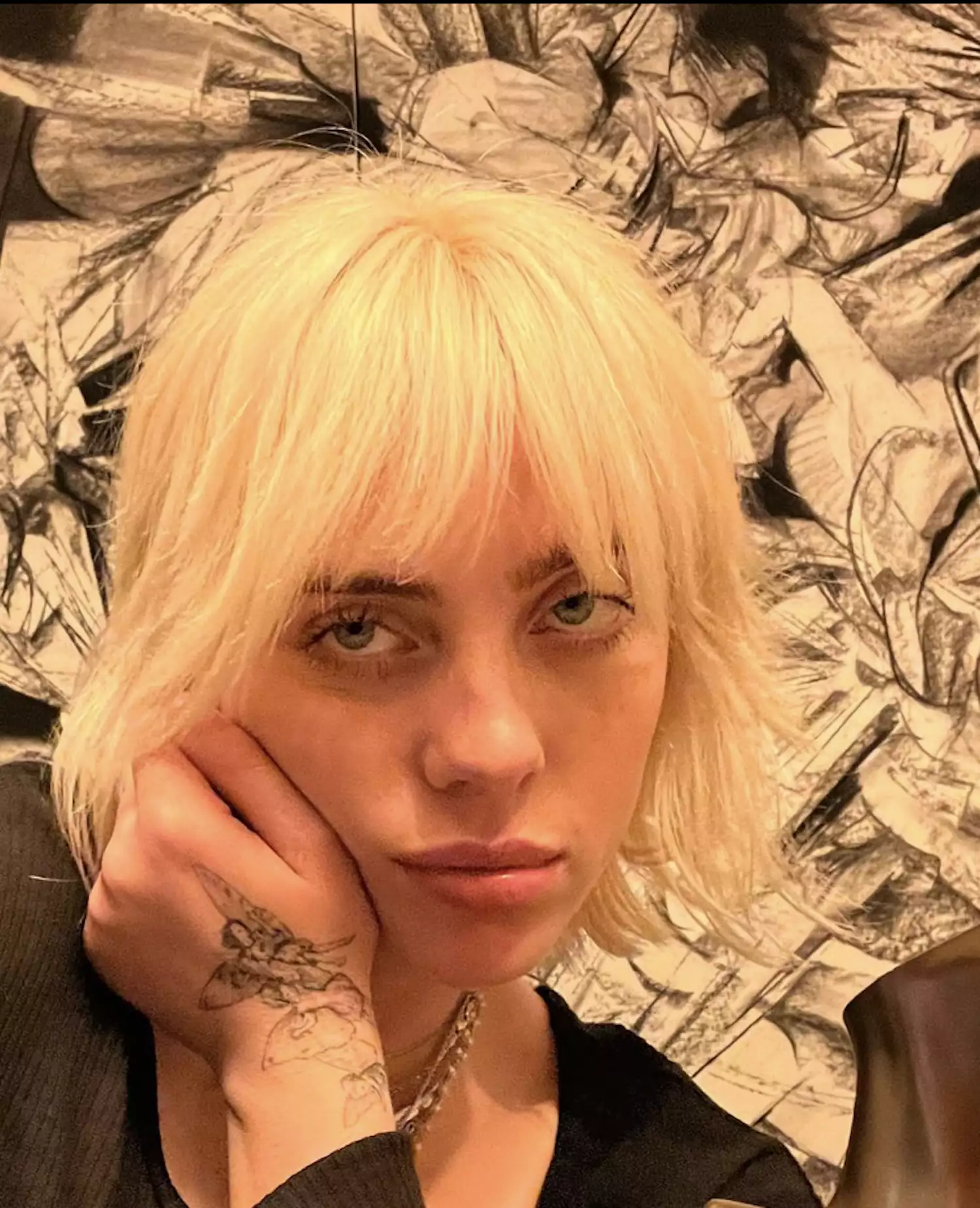 Billie Eilish in a classic bob with bangs