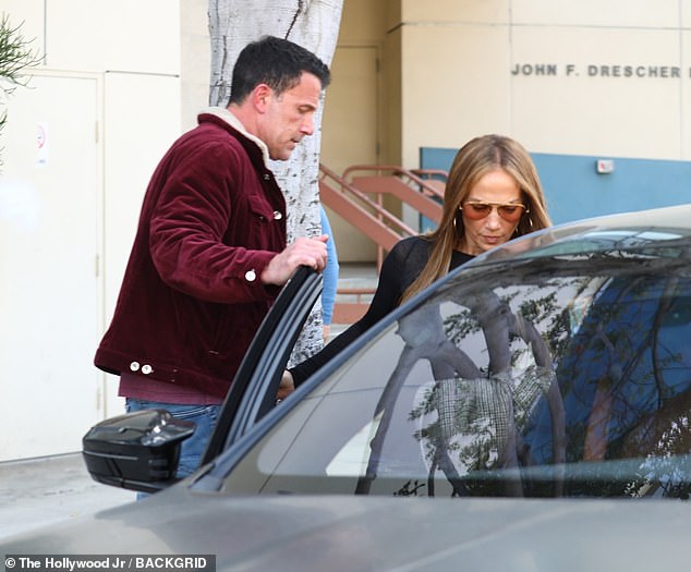 Affleck held the car door open for his spouse as they departed the venue